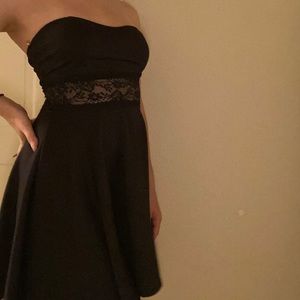 Strapless black mini dress with lace